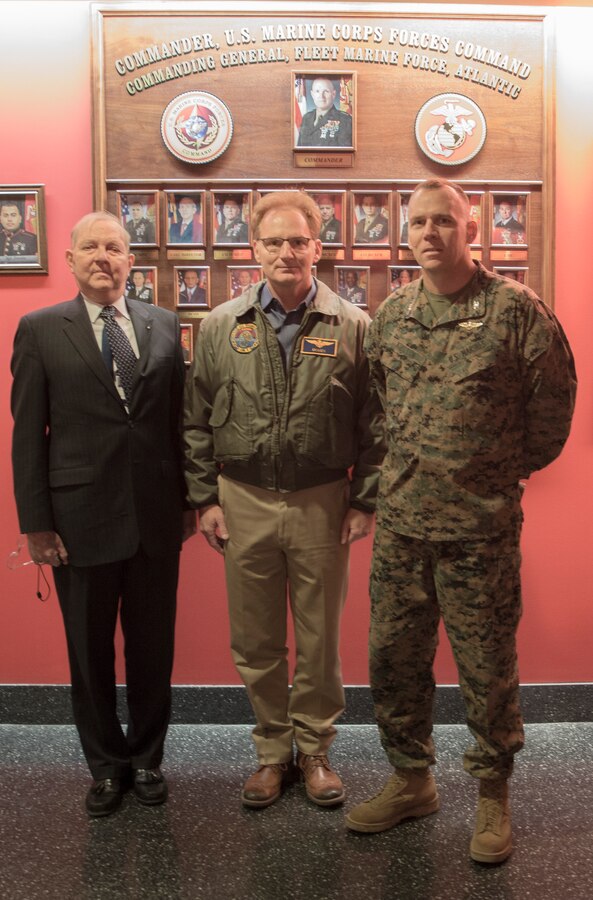 The Honorable Thomas B. Modly, Under Secretary of the Navy, poses with Col. Eric E. Austin, deputy commander, U.S. Marine Corps Forces Command, and James M. McNeal, executive director, U.S. Marine Corps Forces Command, during his visit at MARFORCOM headquarters, Naval Support Activity Hampton Roads, Norfolk, Va., Dec. 13. Under Secretary Modly received a briefing on operations and mission readiness from command staff. (Official U.S. Marine Corps photo by Chris Jones/Released)