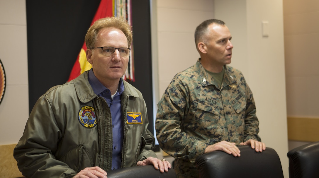 The Honorable Thomas B. Modly, Under Secretary of the Navy, receives a briefing on mission readiness during his visit at MARFORCOM headquarters, Naval Support Activity Hampton Roads, Norfolk, Va., Dec. 13. Under Secretary Modly visited several commands in the span of two days to discuss operations and mission readiness. (Official U.S. Marine Corps photo by Master Sgt. Ryan Ohare/Released)