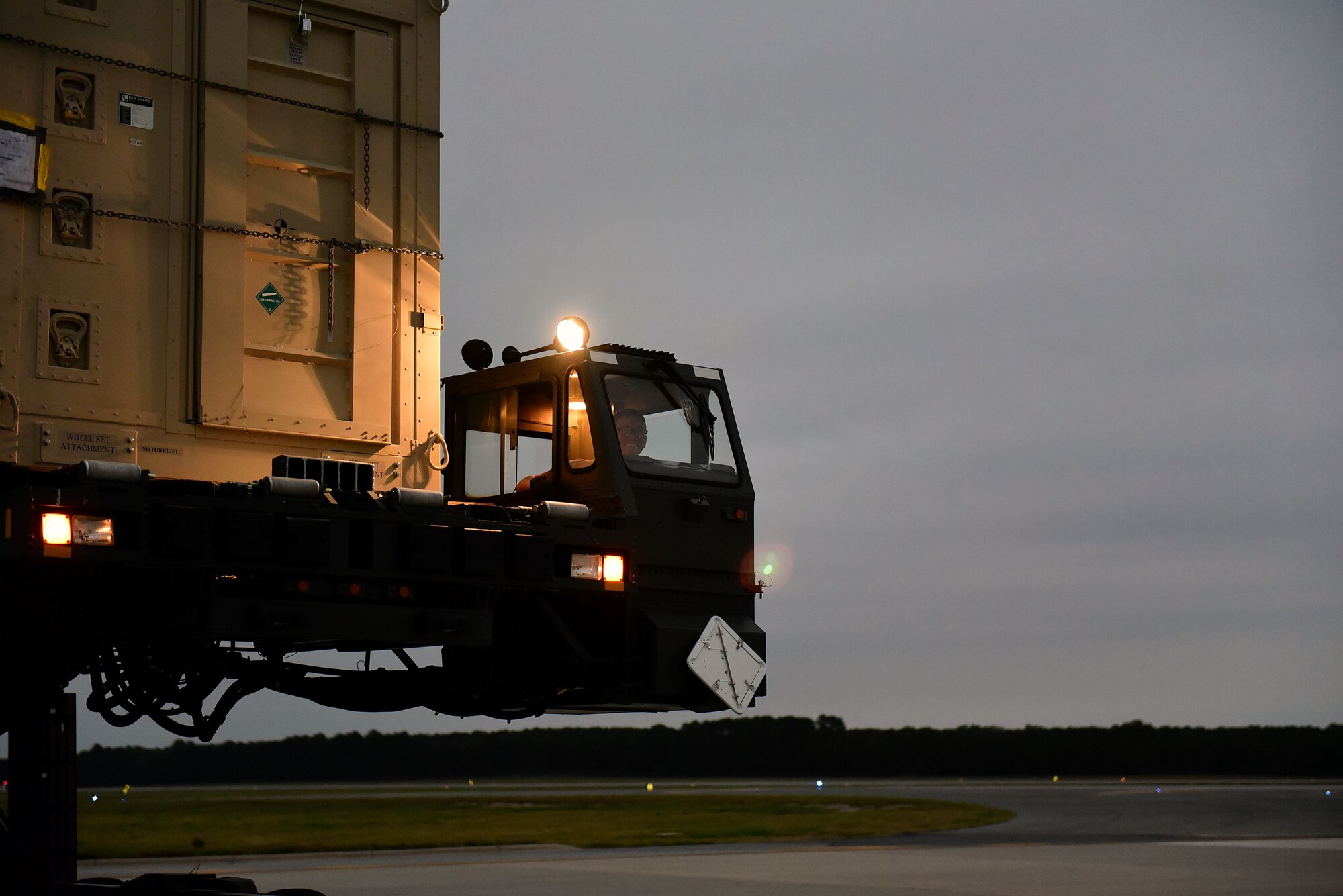 Senior Airman Kyle Wilson, 4th Logistics Readiness Squadron air transportation technician, drives a 60K Tunner cargo loader, Sept. 29, 2017, at Seymour Johnson Air Force Base, North Carolina. In October 2017, Airmen from Seymour Johnson AFB deployed to an undisclosed location in Southwest Asia in support of Operation Inherent Resolve. (U.S. Air Force photo by Airman 1st Class Victoria Boyton)