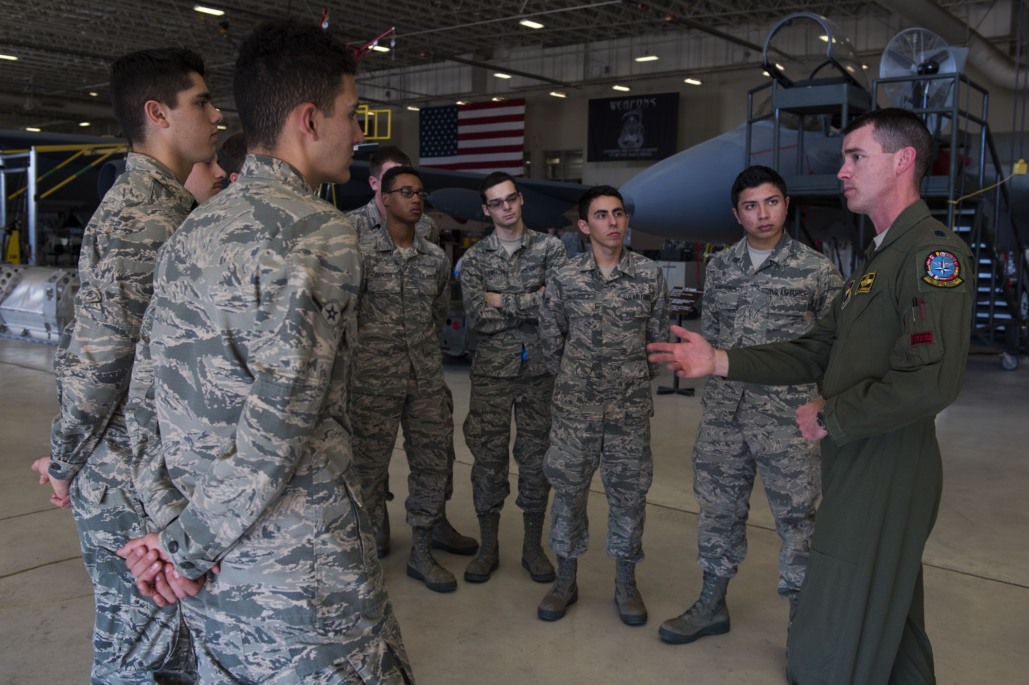 A pilot mentors Airmen.