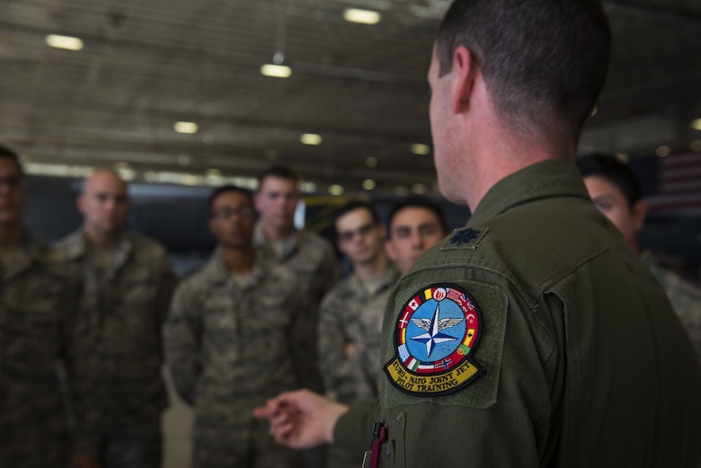 A pilot mentors Airmen.