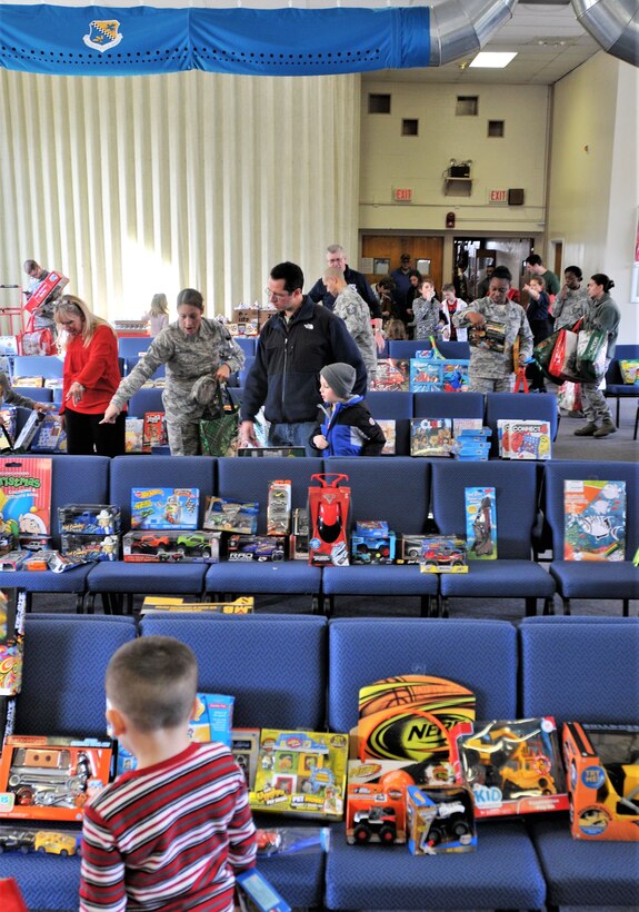 Premium toys donated by Operation Homefront line the chairs during a Holiday event for military families held Dec. 2, 2017, at Horsham Air Guard Station, Pa. The toys were donated to more than 350 children of military families through regional civilian-military partnership programs. (U.S. Air National Guard photo by Tech. Sgt. Andria Allmond)