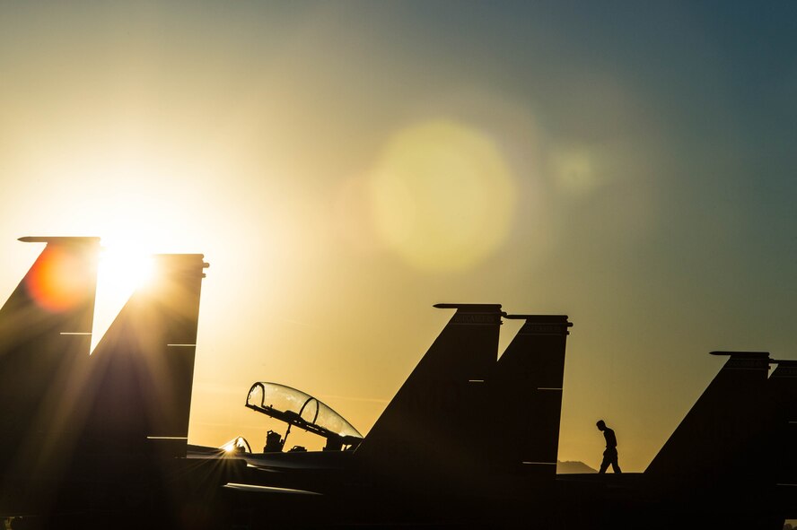 A Republic of Singapore Airman walks on an F-15SG Eagle, assigned to the 428th Fighter Squadron, at Luke Air Force Base, Ariz., Dec. 8, 2017. The 428th FS, from Mountain Home Air Force Base, Idaho, participated in Exercise Forging Sabre, a two-week, large group exercise providing high-end training to Singapore and U.S. armed forces. (U.S. Air Force photo/Staff Sgt. Jensen Stidham)