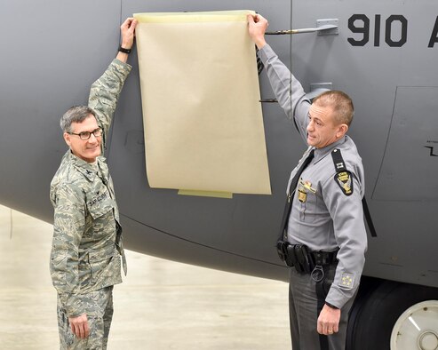 The nose art further signifies the partnership between Youngstown Air Reserve Station with state and local law enforcement agencies.