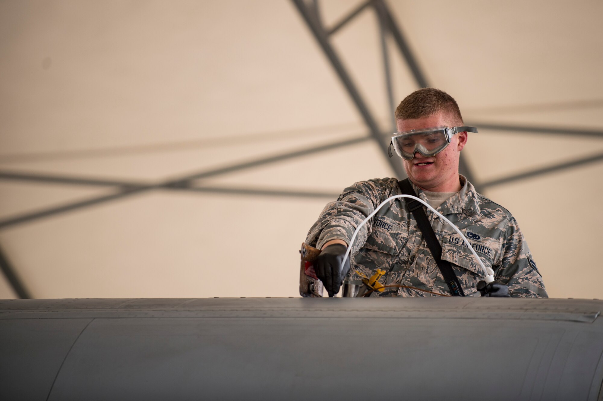 Airman 1st Class Gabriel Vorce, 23d Aircraft Maintenance Squadron crew chief, checks the oil on an A-10C Thunderbolt II during a thru flight inspection, Dec. 7, 2017, at Moody Air Force Base, Ga. Moody recently participated in a week-long, Phase 1, Phase 2 exercise designed to demonstrate the 23d Wing’s ability to meet combatant commander objectives. The exercise tested pilots’ and maintainers’ ability to launch around-the-clock sorties at an accelerated rate during surge operations. (U.S. Air Force photo by Andrea Jenkins)