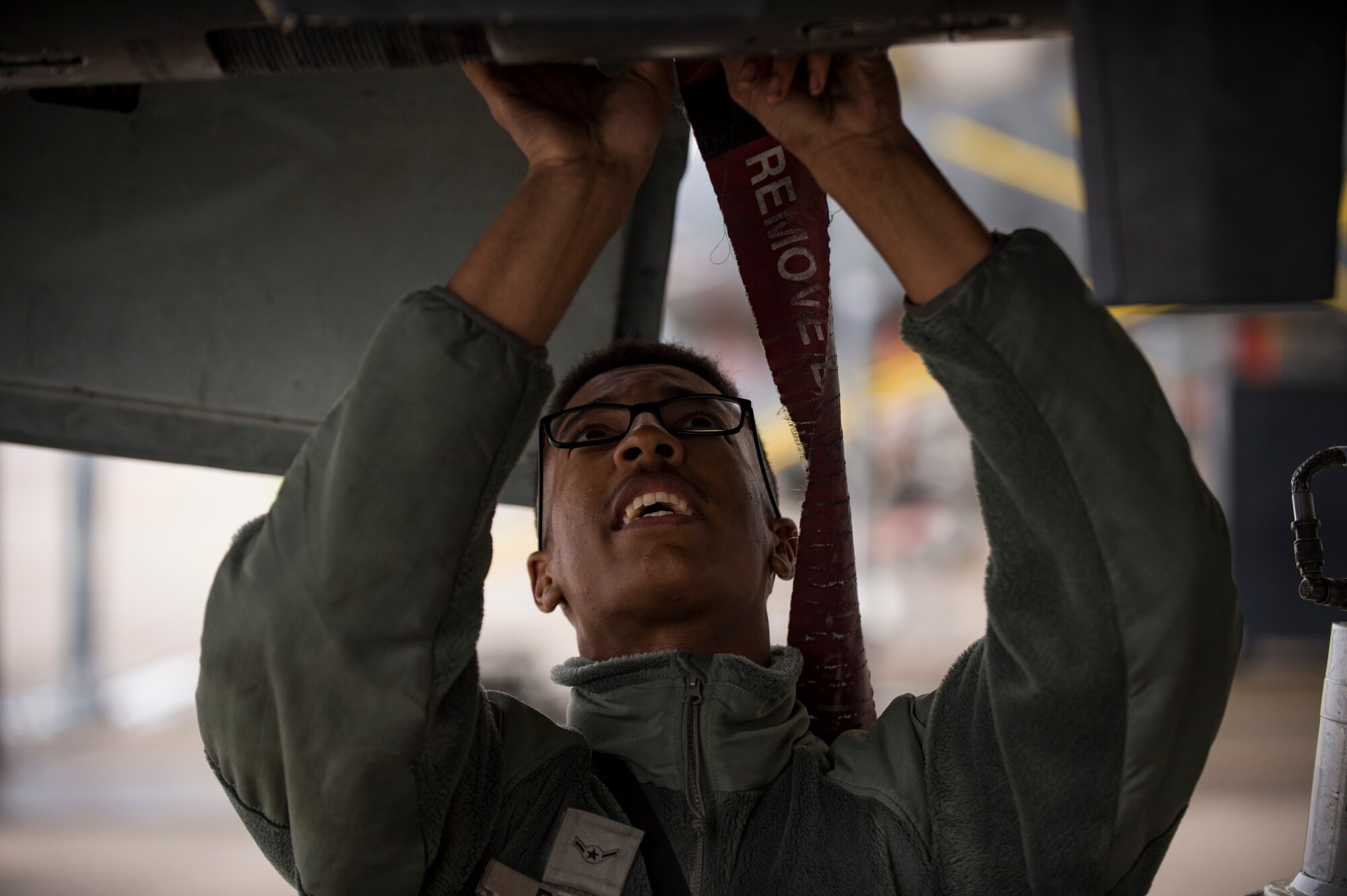 A crew chief from the 23d Aircraft Maintenance Squadron secures a panel on an A-10C Thunderbolt II during a thru flight inspection, Dec. 7, 2017, at Moody Air Force Base, Ga. Moody recently participated in a week-long, Phase 1, Phase 2 exercise designed to demonstrate the 23d Wing’s ability to meet combatant commander objectives. The exercise tested pilots’ and maintainers’ ability to launch around-the-clock sorties at an accelerated rate during surge operations. (U.S. Air Force photo by Andrea Jenkins)
