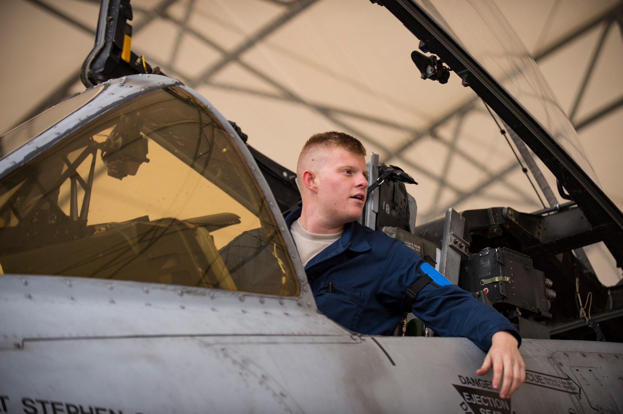 Airman 1st Class Tyler Boyd, 74th Aircraft Maintenance Unit crew chief, yells down to fellow maintainers while performing a thru flight inspection on an A-10C Thunderbolt II, Dec. 7, 2017, at Moody Air Force Base, Ga. Moody recently participated in a week-long, Phase 1, Phase 2 exercise designed to demonstrate the 23d Wing’s ability to meet combatant commander objectives. The exercise tested pilots’ and maintainers’ ability to launch around-the-clock sorties at an accelerated rate during surge operations. (U.S. Air Force photo by Andrea Jenkins)