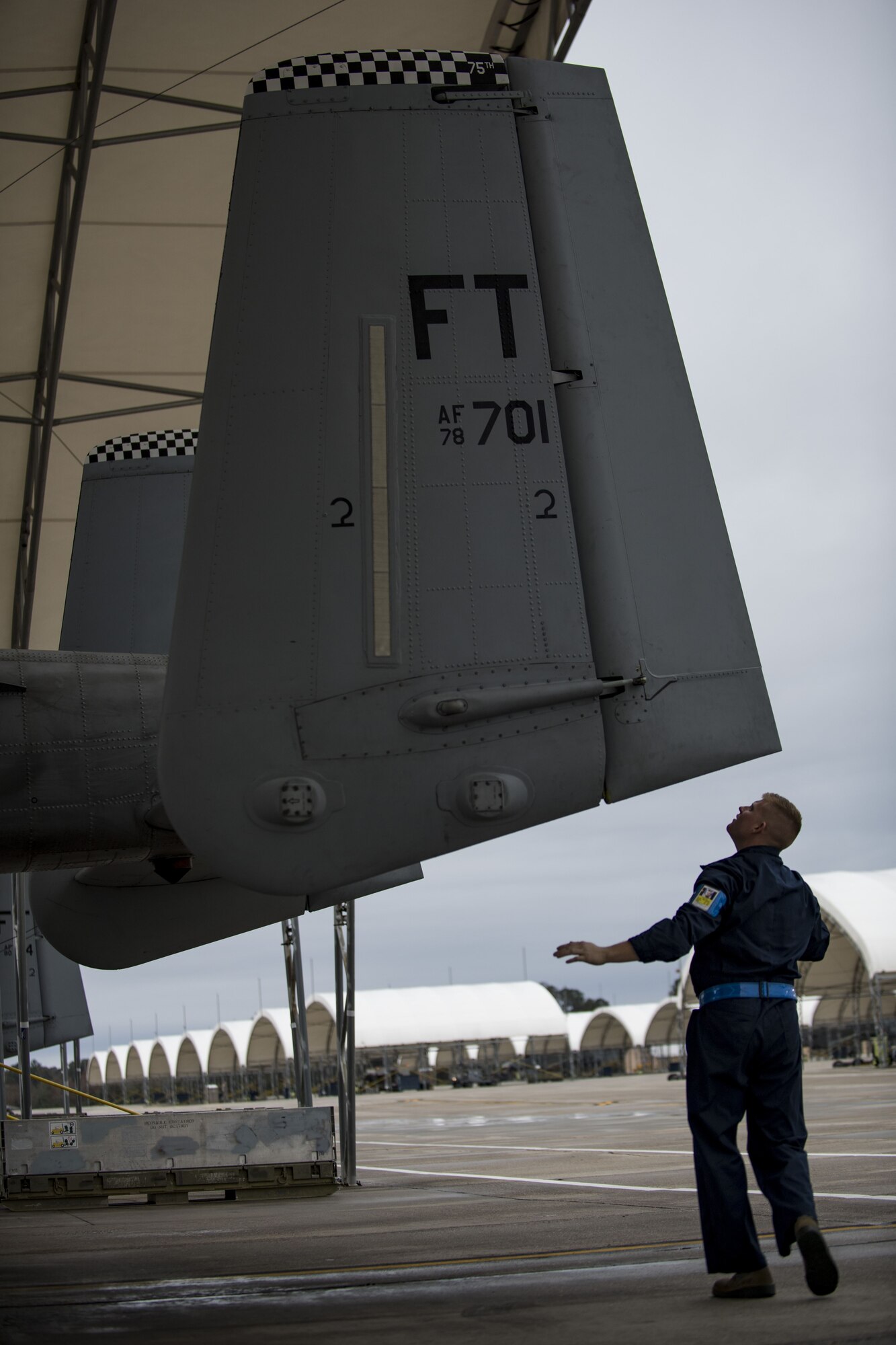 Airman 1st Class Tyler Boyd, 74th Aircraft Maintenance Unit crew chief, performs a thru flight inspection on an A-10C Thunderbolt II, Dec. 7, 2017, at Moody Air Force Base, Ga. Moody recently participated in a week-long, Phase 1, Phase 2 exercise designed to demonstrate the 23d Wing’s ability to meet combatant commander objectives. The exercise tested pilots’ and maintainers’ ability to launch around-the-clock sorties at an accelerated rate during surge operations. (U.S. Air Force photo by Andrea Jenkins)