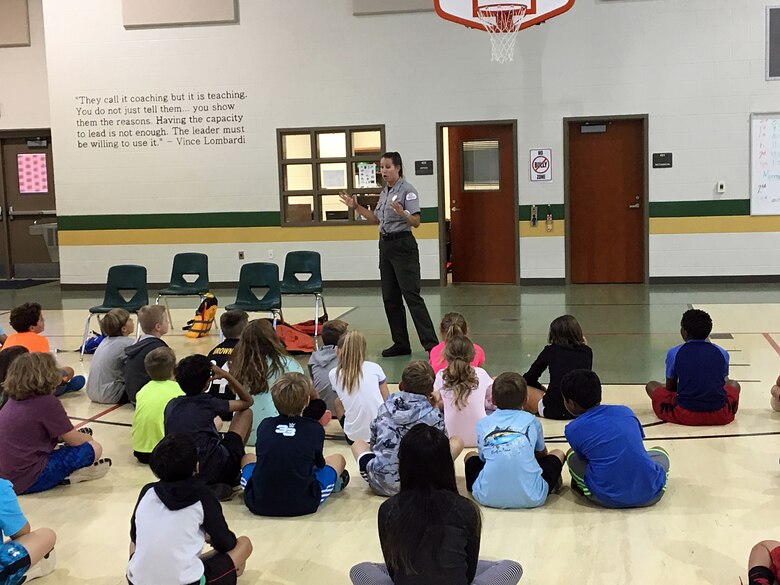 Lake Sidney Lanier Park Ranger Rachel Rush teaches fourth graders the importance of water safety and the beauty of our national parks during a visit to a local school earlier this year. Rush was recently recognized for her efforts to promote the Every Kid in a Park initiative by the U.S. Army Corps of Engineers, South Atlantic Division.