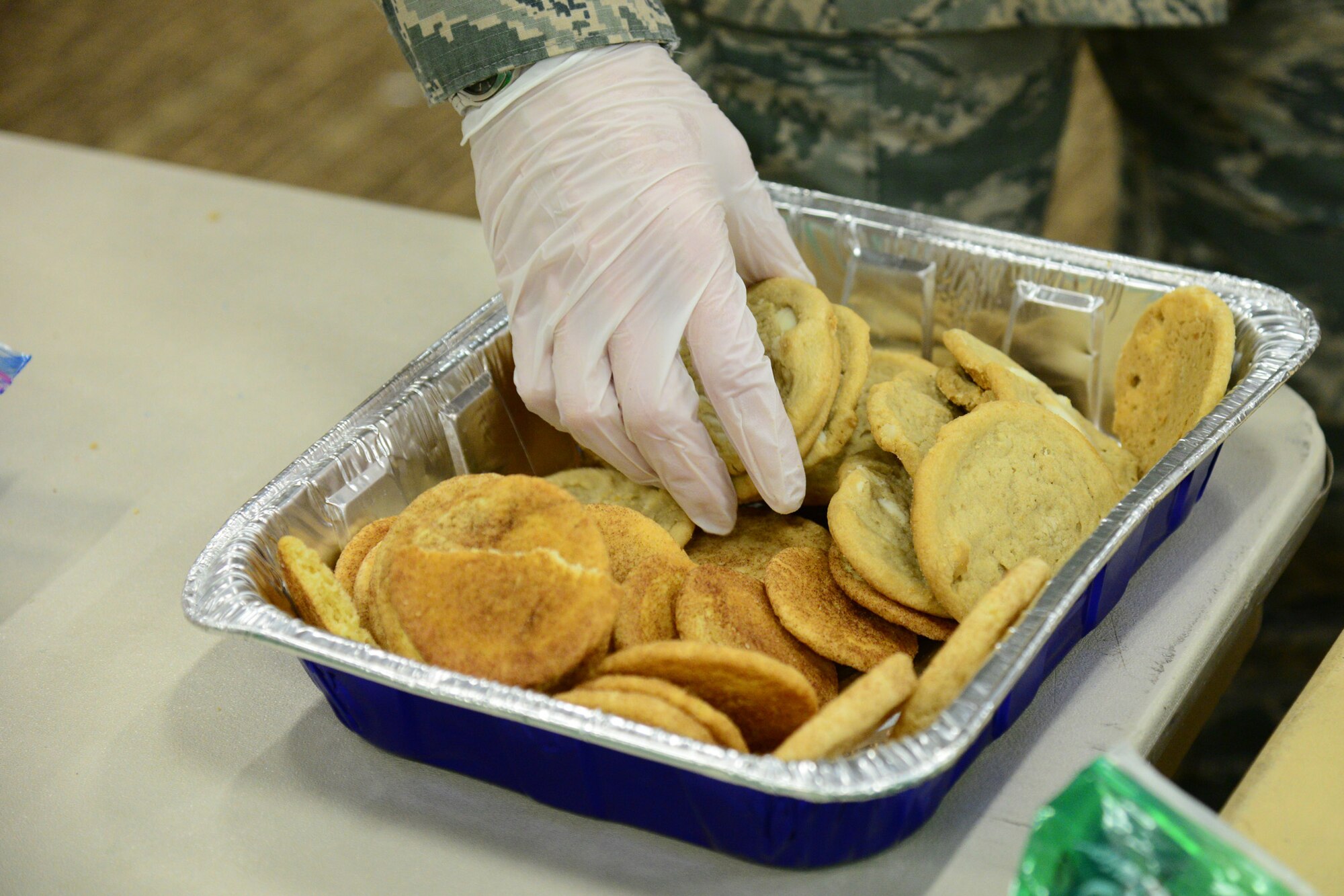 A Cookie Express volunteer collects cookies Dec. 13, 2017, at Malmstrom Air Force Base, Mont.