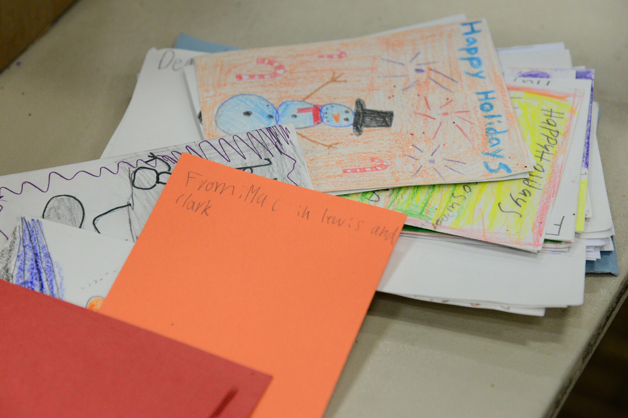 Several cards from the community are displayed on a table for the bag assembly at the annual Cookie Express Dec. 13, 2017, at Malmstrom Air Force Base, Mont.