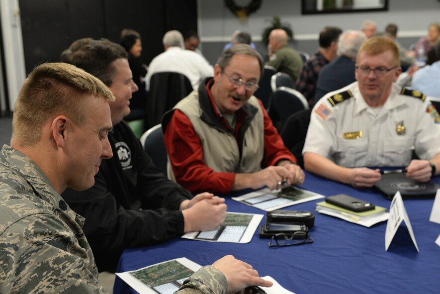 Base leaders and community partners discuss possible initiatives Dec. 12, 2017, on Columbus Air Force Base, Mississippi, during an Air Force Community Partnership meeting. These gatherings help develop new and better ways to benefit the Air Force and the surrounding communities through emergency management, Airmen Against Drunk Driving, downtown shooting range use and more. (U.S. Air Force photo by Airman 1st Class Keith Holcomb)