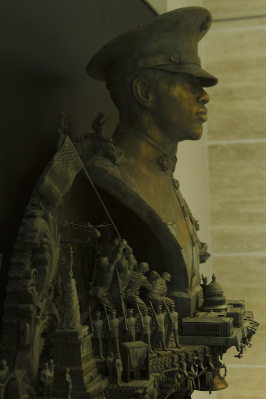 Nation’s Call, one of three of Marine Corps Recruiting Command’s statues, is unveiled at the National Marine Corps Museum in Triangle, Virginia, Dec. 13, 2017. The sculptures were crafted by Kris Kuksi for MCRC’s Battles Won brand idea and its advertisements, but also to represent the irreducible fighting spirit of Marines. Kuksi is an artist contracted to work with MCRC's contracted advertisement agency, J. Walter Thompson. (U.S. Marine Corps photo by Pfc. Mitchell Collyer)