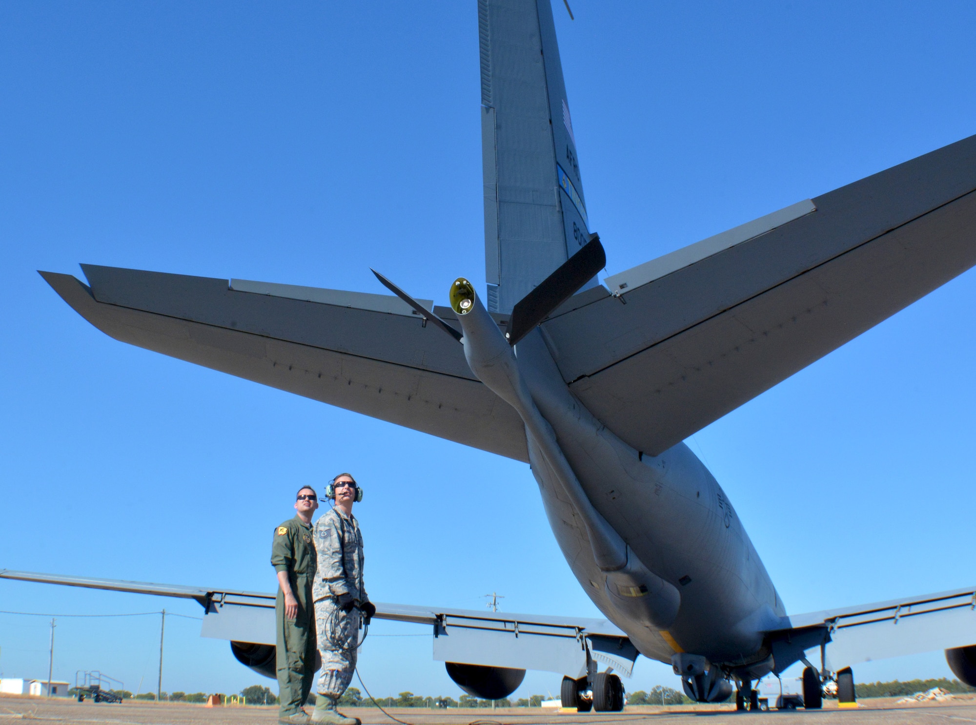 507th Aircraft Maintenance Squadron Tech. Sgts. Michael Dunning, crew chief, and Eric Harmon, avionics technician, from Tinker Air Force Base, Okla., observe flight operations while preparing a KC-135R Stratotanker for flight at Eglin AFB, Fla., Nov. 28, 2017. 507th Air Refueling Wing Reserve Citizen Airmen from Tinker AFB flew the KC-135R to Eglin AFB for testing of the Large Aircraft Infrared Countermeasures modification recently installed on the aircraft. (U.S. Air Force photo/Tech. Sgt. Samantha Mathison)