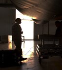 Staff Sgt. Kirsten Milkowski, 507th Aircraft Maintenance avionics technician, walks toward her team members during the installation of the Large Aircraft Infrared Countermeasures pod onto a KC-135 Oct. 25, 2017 at Tinker Air Force Base, Okla. (U.S. Air Force photo/Tech. Sgt. Samantha Mathison)