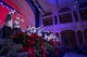 Children ring bells on stage during a United States Air Forces in Europe Band Christmas concert at Fruchthalle in Kaiserslautern, Germany, Dec. 8, 2017. The children rang the bells while the USAFE Band played Christmas music for local community members. (U.S. Air Force photo by Senior Airman Devin Boyer)