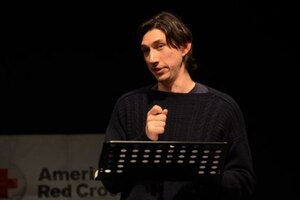 A man speaks on stage.