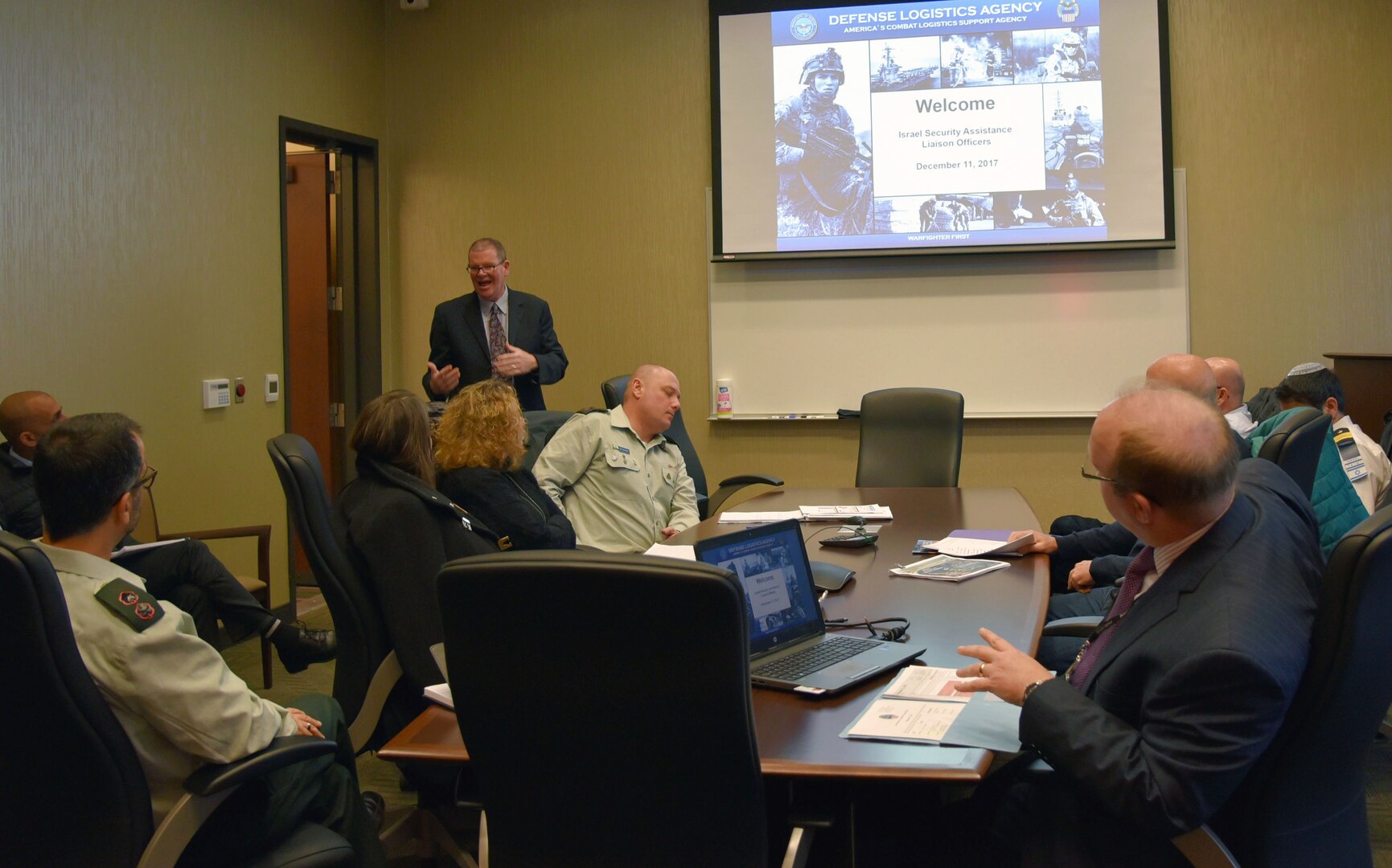 Scott Rosbaugh, director of DLA Distribution’s Strategic Plans directorate, discusses DLA Distribution’s core capabilities with Israel Security Assistance Liaison Officers on December 11.