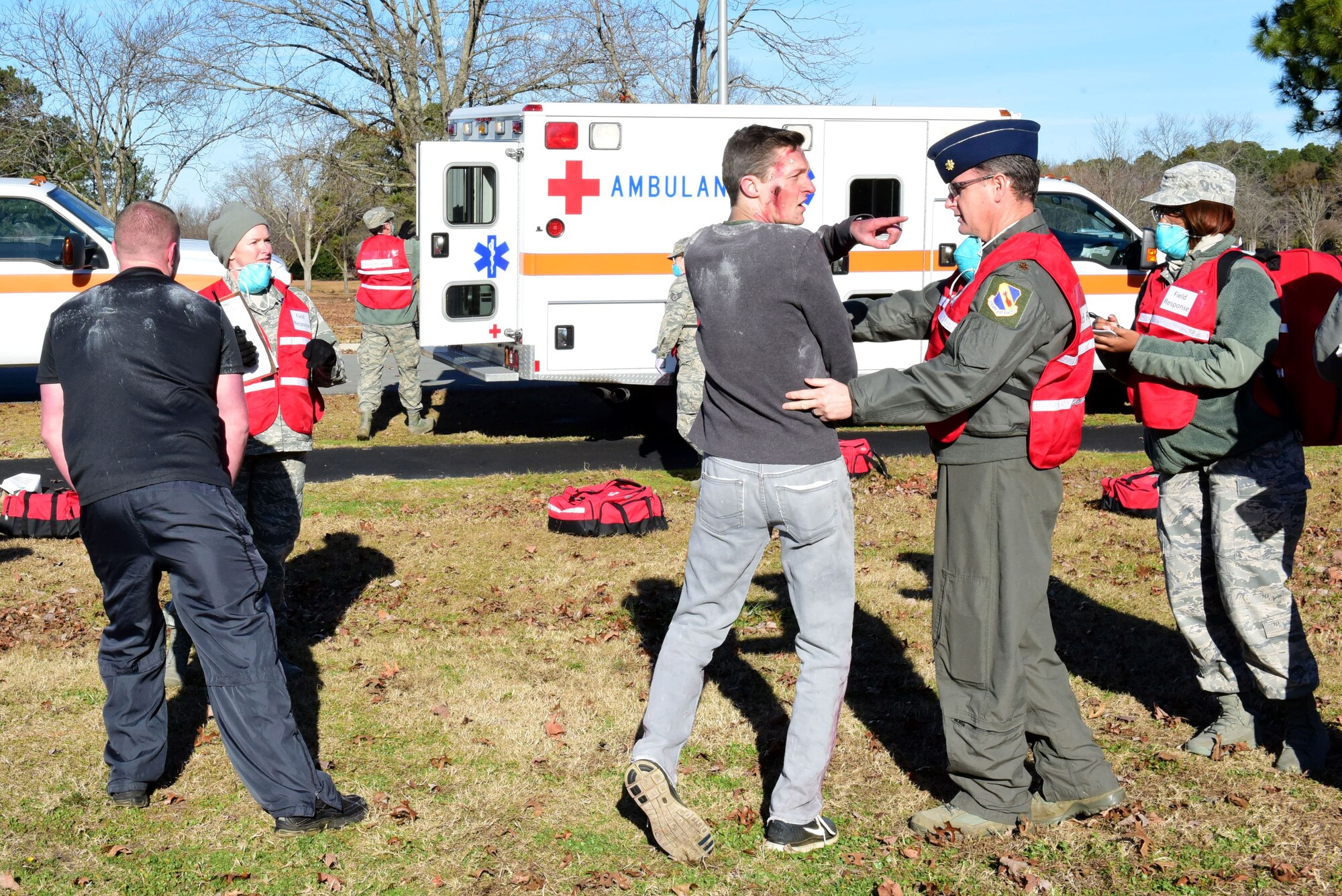 Members of the 4th Medical Group respond to exercise participants with simulated injuries during a mass casualty exercise Dec. 13, 2017, at Seymour Johnson Air Force Base, North Carolina.