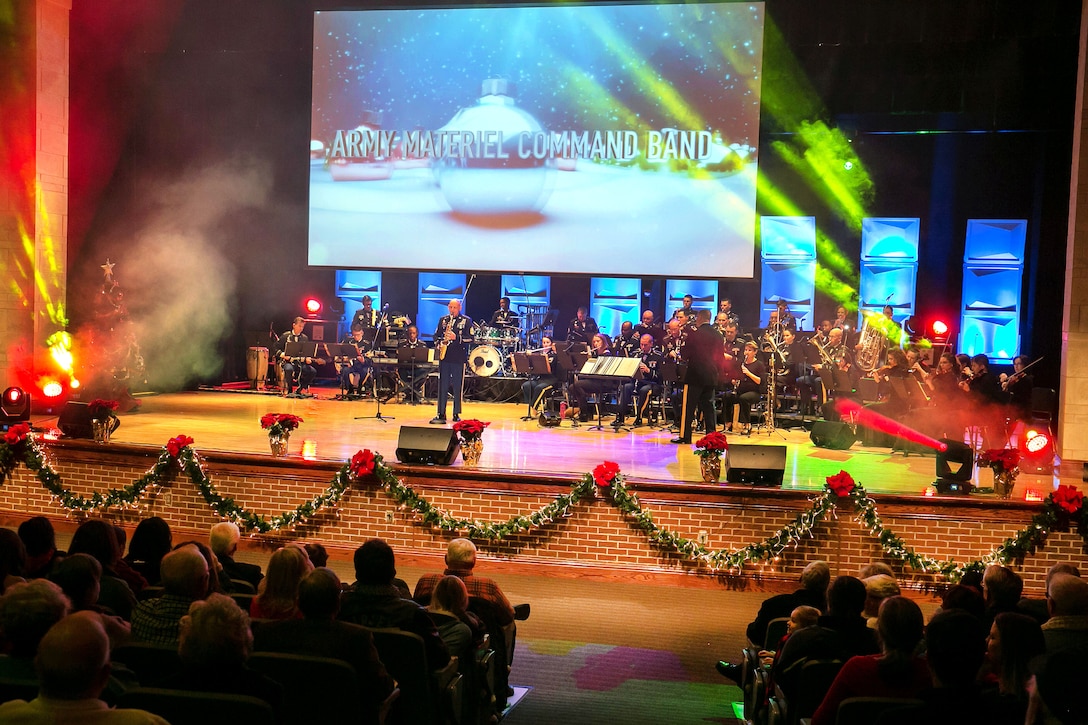 Service members, families, veterans and friends attend a holiday concert performed by the Army Materiel Command's band.