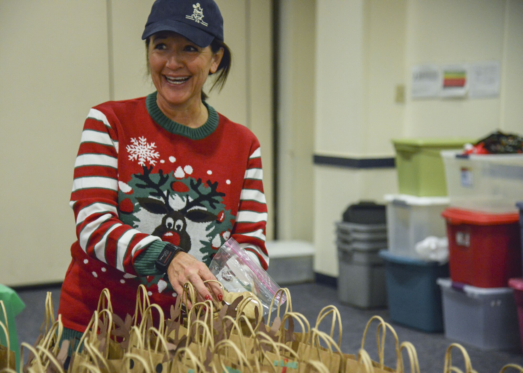 Jean Morris, spouse of Maj. Gen. Shaun Q. Morris, Air Force Nuclear Weapon Center commander, bags cookies during the Kirtland Spouse’s cookie drive at Kirtland Air Force Base, N.M., Dec. 12. The cookie drive’s purpose is to raise morale for Airmen, as many of them are spending the holidays away from their families.