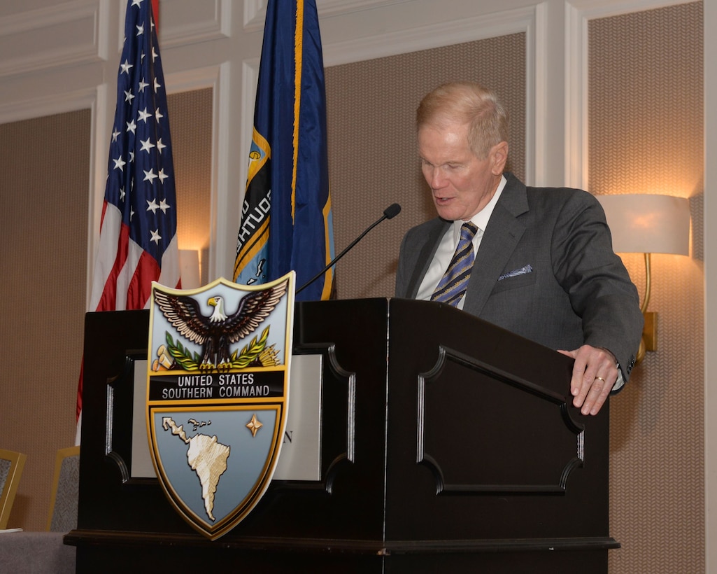 Sen. Bill Nelson speaks from a podium.