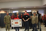 DLA Distribution Red River commander Army Lt. Col. Jeffery Chamberlain recognizes the Red River employees with November birthdays during the Red River annual Employee Appreciation Day on Nov. 17.