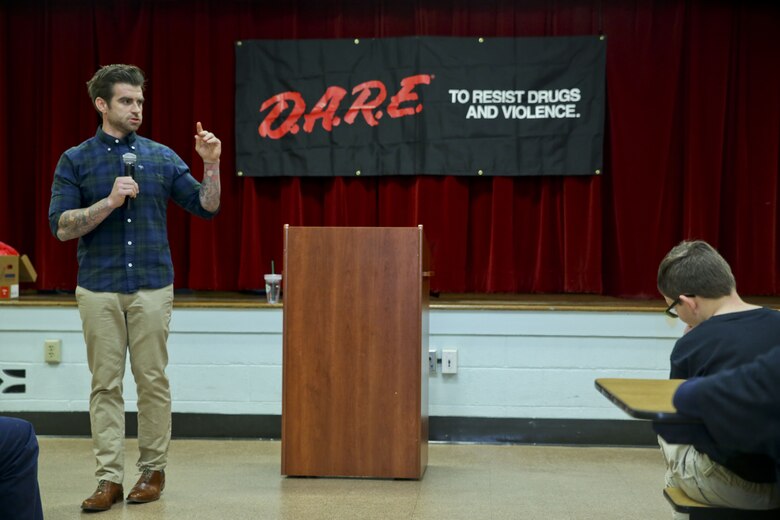 Jason Clark speaks to students at the graduation of the Drug Abuse Resistance Education program at Laurel Bay, Dec. 8. The goal of the program is the educate students on the danger of substance abuse. Clark was the guest speaker at the graduation.