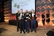 Col. Doug DeMaio (center), Curtis E. LeMay Center for Doctrine Development and Education vice commander and 2017 Maxwell Air Force Base Air Show director, receives the Dick Schram Memorial Community Relations Award Dec. 6, 2017, at the International Council of Air Shows Chairman's Banquet in Las Vegas, Nev. The award was presented for having the best air show in 2017. (Courtesy photo by Larry Grace)