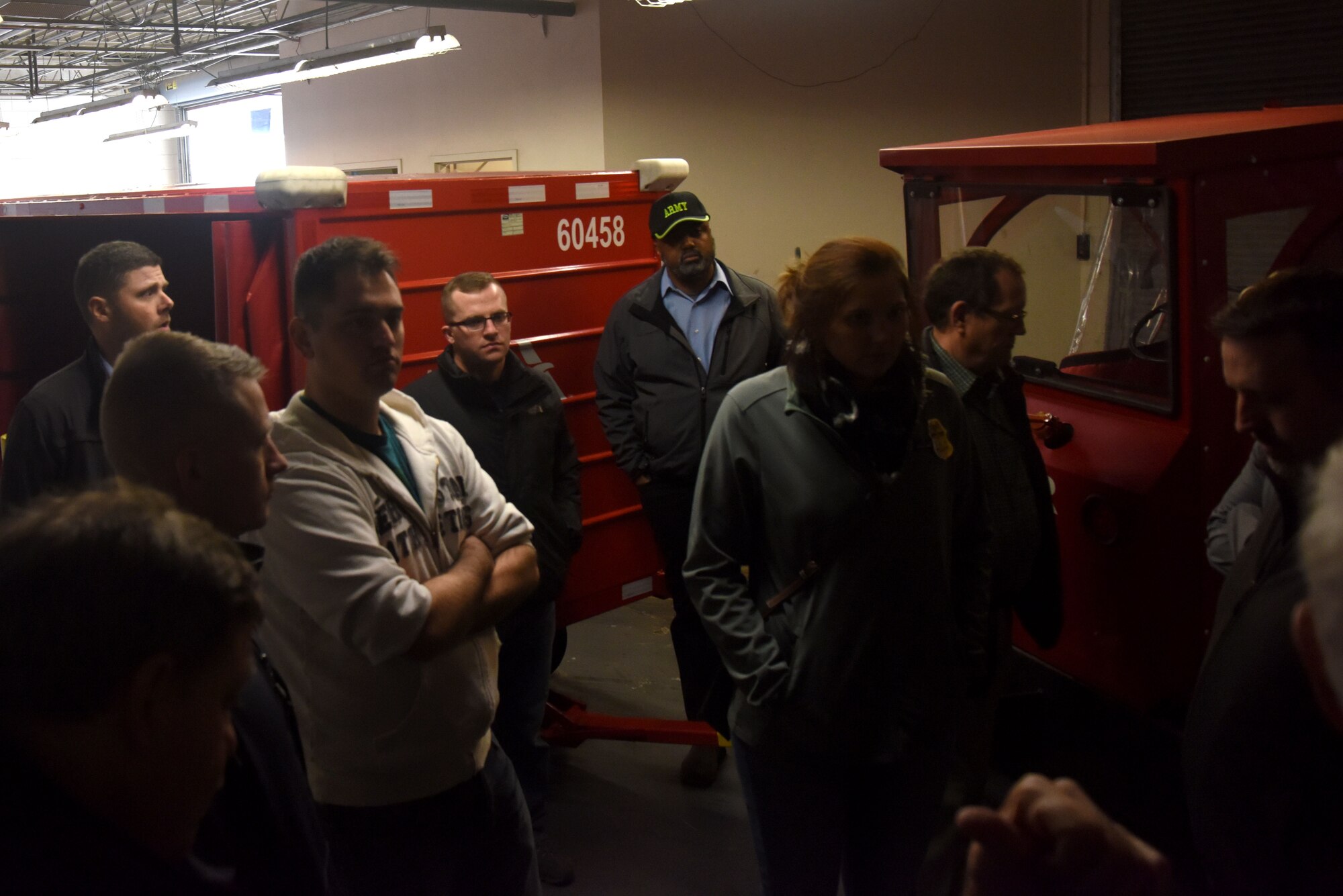 Students from multiple agencies attending the Aviation Domain Awareness Training Course receive a briefing during a tour of the Mathis Airfield, San Angelo, Texas, Dec. 7, 2017. The students participating in the course had many rare opportunities to see behind the scenes during the tour to learn about security protocols and measures. (U.S. Air Force photo by Airman 1st Class Seraiah Hines/Released)