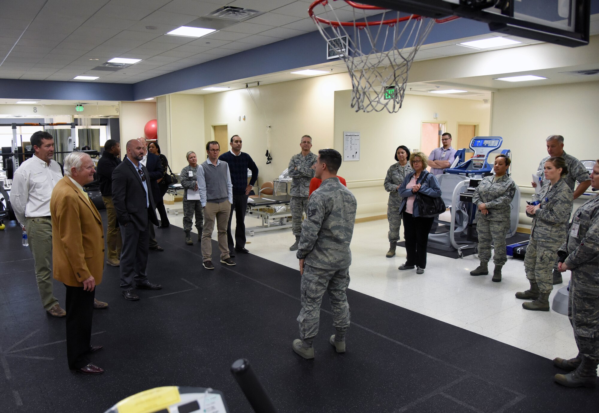 Staff Sgt. Wesley McCool, 81st Surgical Operations Squadron occupational therapy NCO in charge, briefs on the 81st Medical Group’s physical therapy capabilities during a Keesler honorary commanders’ tour at the Keesler Medical Center Dec. 12, 2017, on Keesler Air Force Base, Mississippi. The honorary commander program is a partnership between base leadership and local civic leaders to promote strong ties between military and civilian leaders. (U.S. Air Force photo by Kemberly Groue)