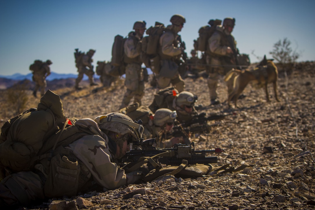 U.S. Marines with 2nd Battalion, 5th Marine Regiment, 1st Marine Division, provide cover fire during an air assault, part of exercise Steel Knight 2018 at Marine Corps Air Ground Combat Center, Twentynine Palms, Calif., Dec. 7, 2017.