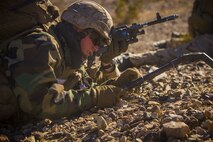 A U.S. Marine with 2nd Battalion, 5th Marine Regiment, 1st Marine Division, assembles a M240 medium machine gun during an air assault, part of Steel Knight exercise at Marine Corps Air Ground Combat Center, Twentynine Palms, Calif., Dec. 7, 2017.