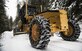 Tech. Sgt. Kyle Hiener, 336th Training Support Squadron field’s operations NCO in-charge, operates a motor-grader to remove snow from roads in the Air Force Survival School Training Area in Cusick, Washington, Dec. 7, 2017. These Airmen are known throughout the Air Force as Civil Engineer “Dirt Boys,” but when they’re a part of the 336th Training Support Squadron, they’re called “Road Runners.” The Road Runners operate various vehicles to clear back roads in the National Forest, to include: motor graders, loaders, bulldozers and dump trucks. (U.S. Air Force photo/Senior Airman Sean Campbell)
