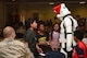 Children talk to a Stormtrooper during Operation Provide Joy at F.E. Warren Air Force Base, on Dec. 9, 2017. This year approximately 45 children attended the event. The event was established to booster community partnership and help local families in need get their children into the holiday spirit. (U.S. Air Force photo by Airman 1st Class Abbigayle Wagner)