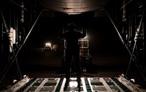 Airman 1st Class Courtney Wagner, 774th Expeditionary Airlift Squadron loadmaster, marshals a forklift onto a C-130J Super Hercules Dec. 9, 2017 at Bagram Airfield, Afghanistan.