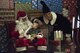 The child of a servicemember assigned to the 86th Airlift Wing looks at Santa Claus before having his photo taken at the Rudolph the Red Nosed Herc event on Ramstein Air Base, Germany, Dec. 14, 2017. The event was hosted by the 86th Maintenance Group. (U.S. Air Force photo by Senior Airman Devin M. Rumbaugh)