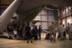 Airmen and their families, assigned to the 86th Airlift Wing, stand in line to have their photos taken with Santa Claus and his elves during the Rudolph the Red Nosed Herc event on Ramstein Air Base, Germany, Dec. 14, 2017. The 86th Maintenance Group decorated a U.S. Air Force C-130J Super Hercules with a red nose and antlers. (U.S. Air Force photo by Senior Airman Devin M. Rumbaugh)