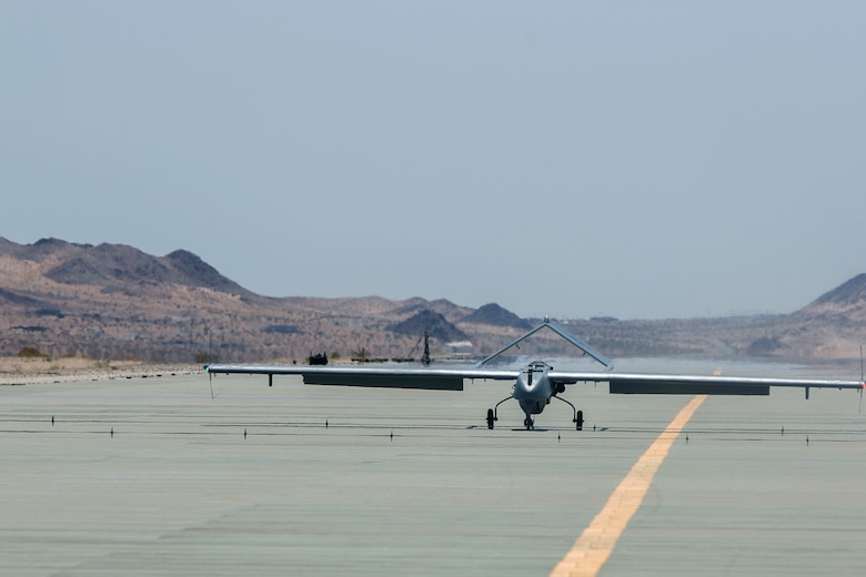 An RQ-7B Shadow belonging to Marine Unmanned Aerial Squadron 4, Marine Aircraft Group 41, 4th Marine Aircraft Wing, Marine Forces Reserve, lands on an airstrip at Camp Wilson, Marine Air Ground Combat Center Twentynine Palms, California, June 22, 2017, after a reconnaissance mission during Integrated Training Exercise 4-17.