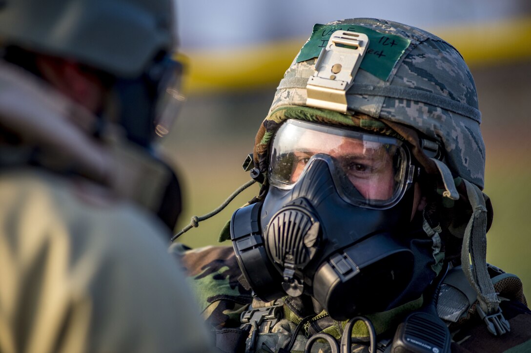 An airman has a breathing apparatus on.