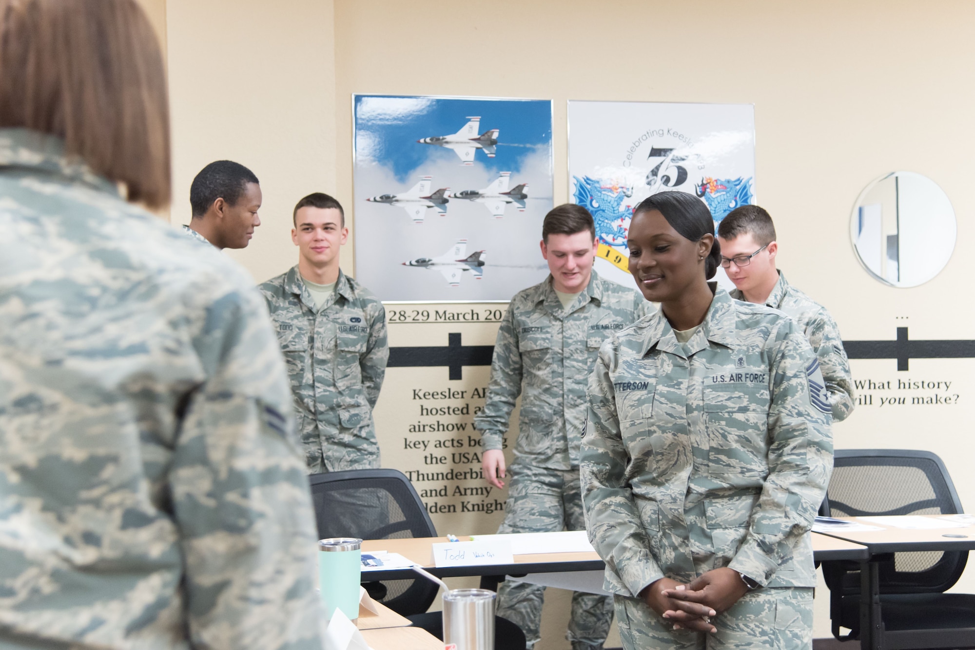 Senior Master Sgt. Tiffany Patterson, Keesler career assistance advisor, leads a group of Airmen in an activitiy called "find the common thread" during a First Term Airman's Course Dec. 11, 2017 at Keesler Air Force Base, Mississippi. (U.S. Air Force photo by Staff Sgt. Heather Heiney)