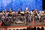 Lt. Gen. Jeffrey Buchanan, U.S. Army North commanding general, introduces the U.S. Air Force Band of the West and the 323rd Army Band "Fort Sam's Own" as they team up for a "Holiday in Red, White and Blue" concert Dec. 9, 2017 at the Edgewood Performing Arts Center, 402 Lance St., in San Antonio. The annual performance is free and open to the public and is a holiday tradition.