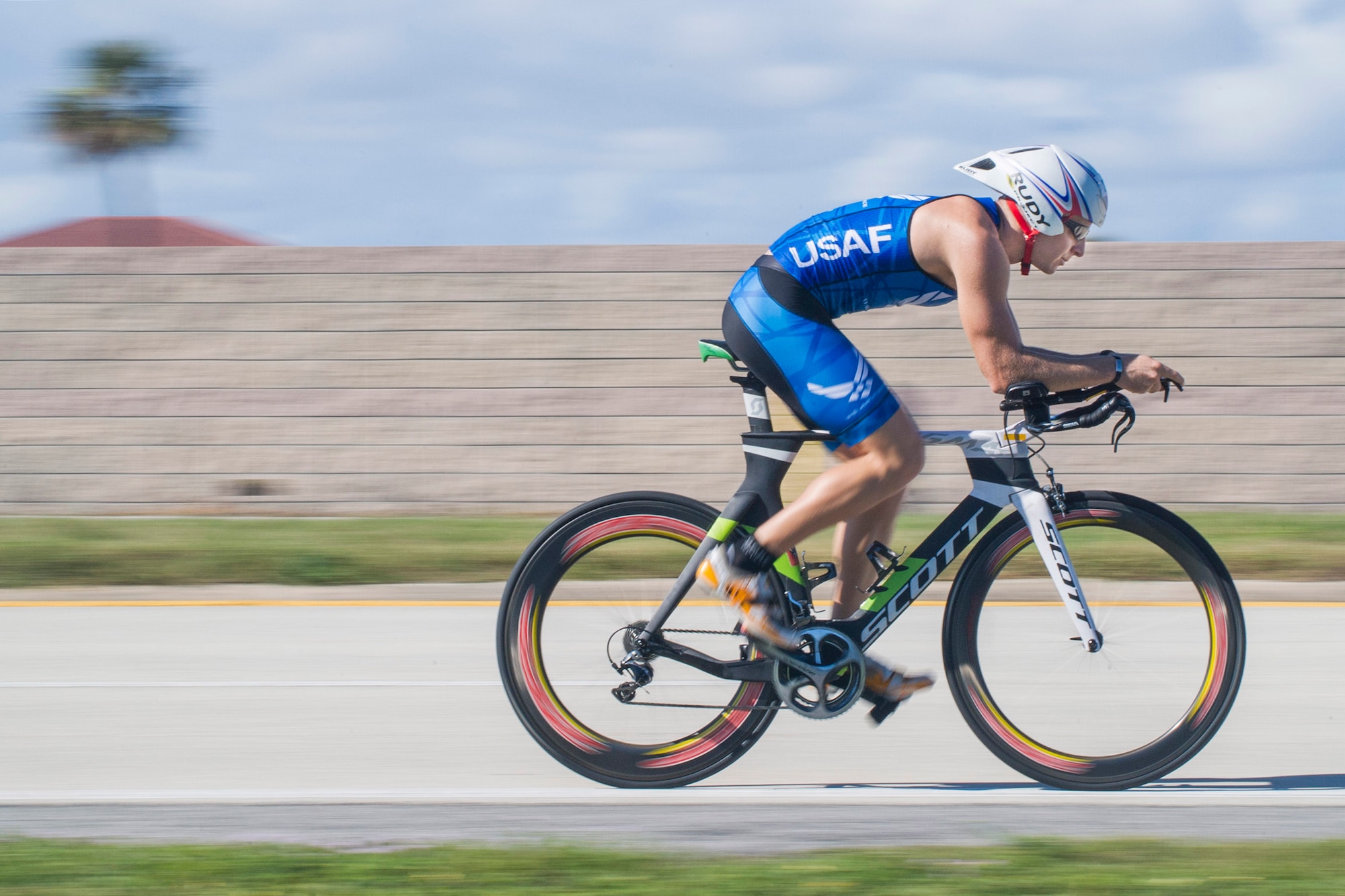 First Lt. Carl Eichert, a special nuclear events analyst for the Air Force Technical Applications Center, Patrick AFB, Fla., races up State Road A1A along Florida’s Space Coast in preparation for the 2018 Ironman World Championship in Hawaii.  Eichert qualified for the triathlon after competing in an event that consisted of a 1.2-mile swim, a 56-mile bike ride, and a 13.1 run.  (U.S. Air Force photo by Phillip C. Sunkel IV)