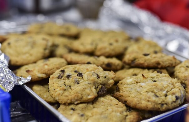 Homemade cookies sit on a table during the annual holiday cookie drive hosted by the Team Ellsworth Spouses Club at Ellsworth Air Force Base, S.D., Dec. 14, 2017. The TESC collected over 10,000 cookies donated by the local community and delivered them to more than 700 Airmen living in base dormitories. (U.S. Air Force photo by Senior Airman Randahl J. Jenson)