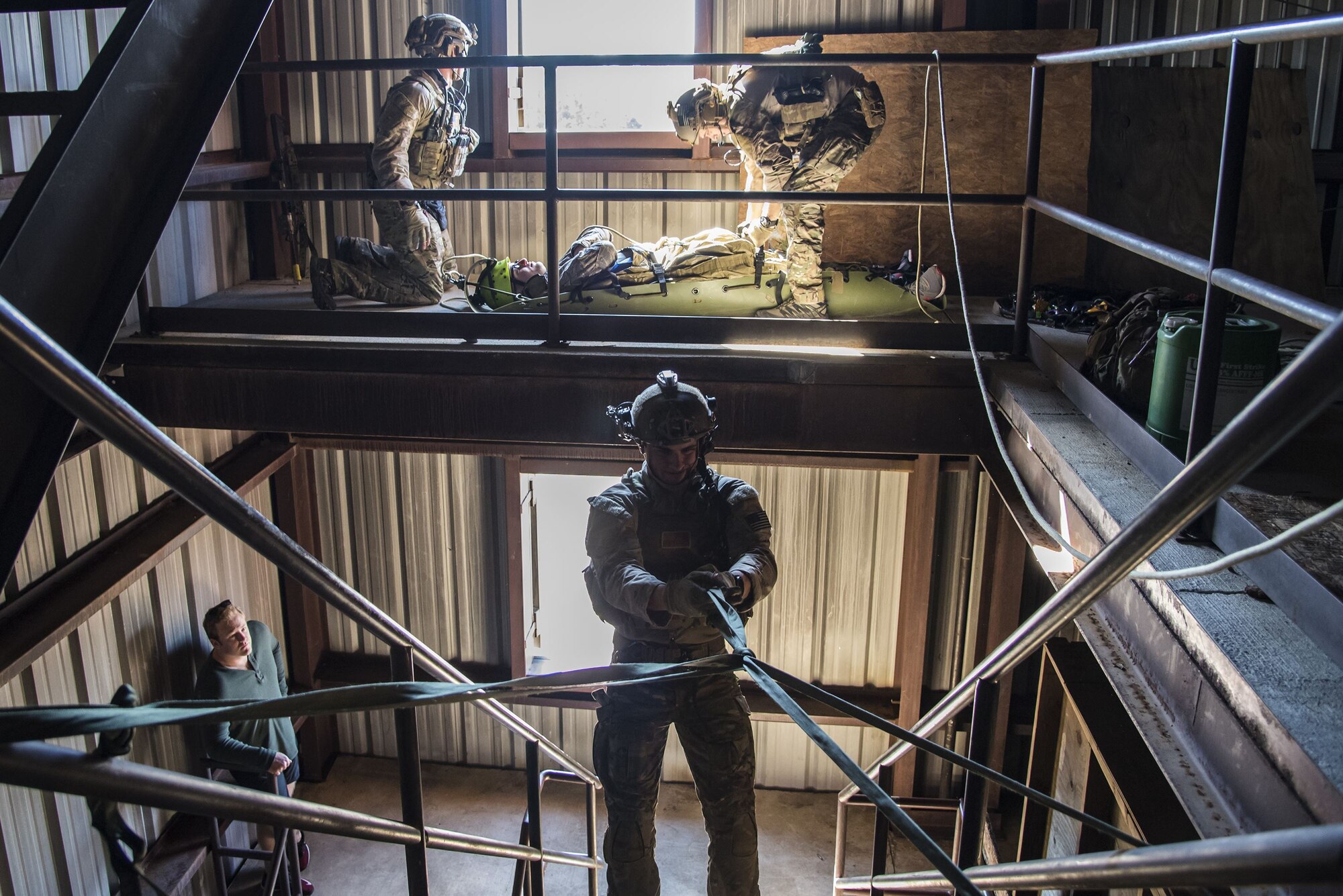 Pararescuemen from the 38th Rescue Squadron (RQS) perform rescue operations during a full mission profile exercise, Dec. 12, 2017, at Moody Air Force Base, Ga. During the training, the 38th RQS recovered victims while under enemy fire to prepare for future search and rescue missions and to assess their unit’s ability to work cohesively to accomplish the mission. (U.S. Air Force photo by Airman Eugene Oliver)