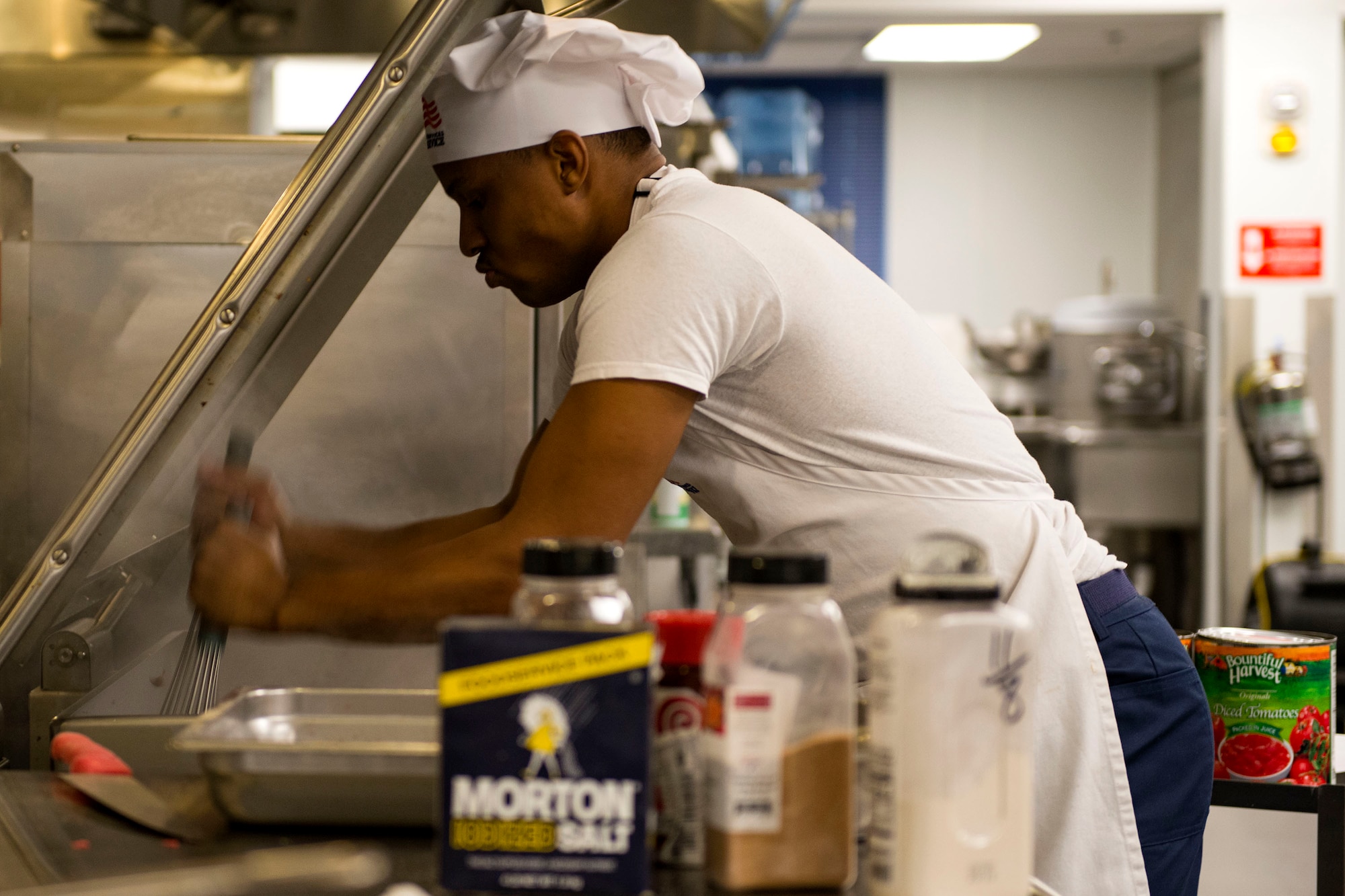 Senior Airman Cameron Morrow, 23d Force Support Squadron food services journeyman, whisks ground beef for pasta sauce in the Georgia Pines Dining Facility (DFAC), Dec. 12, 2017, at Moody Air Force Base, Ga. Through teamwork, adaption and striving for excellence, the Georgia Pines DFAC Airmen are able to ensure Team Moody is fed and ready to finish the fight. (U.S. Air Force Base photo by Airman 1st Class Erick Requadt)