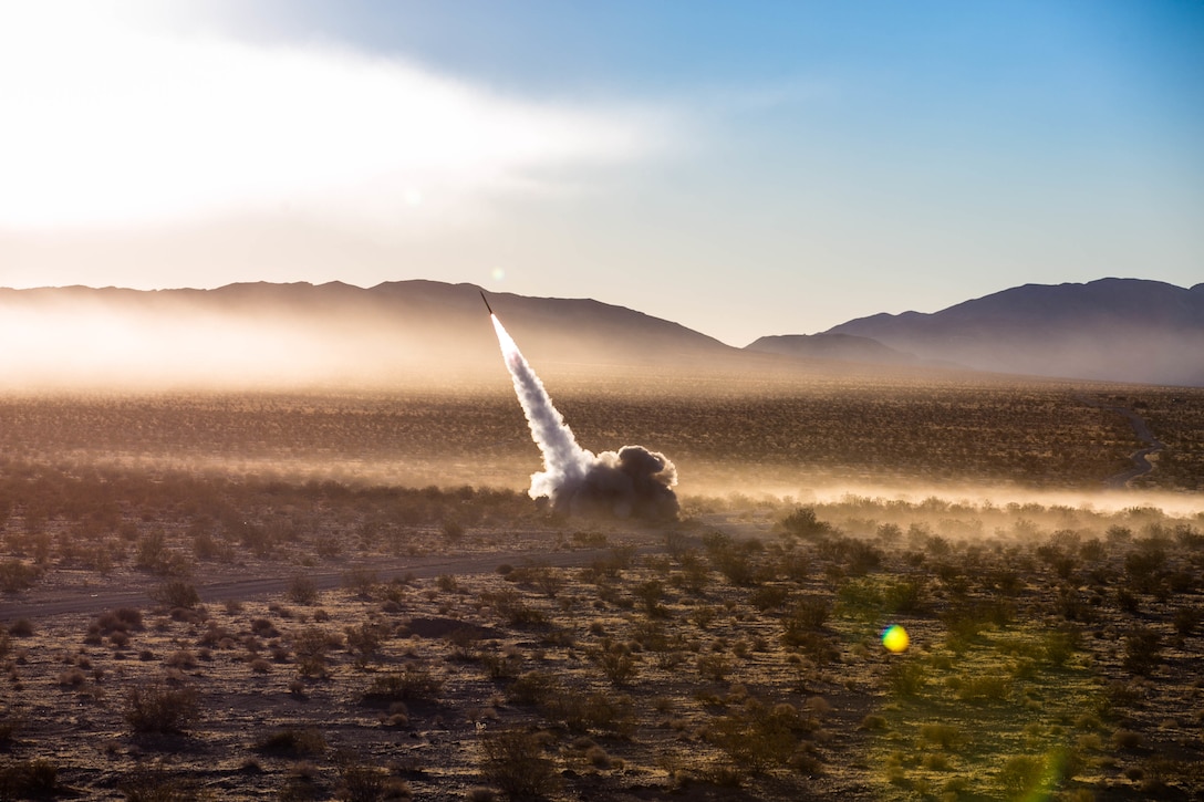 U.S. Marines assigned to Battery R, 5th Battalion, 11th Marine Regiment launch the High Mobility Artillery Rocket System from a Guided Multiple Launch Rocket System during Operation Steel Knight aboard the Marine Corps Air Ground Combat Center, Twentynine Palms, Calif., Dec. 7, 2017. HIMARS is a precision rocket system used to eliminate enemy positions with extreme accuracy. (U.S. Marine Corps photo by Pfc. William Chockey)