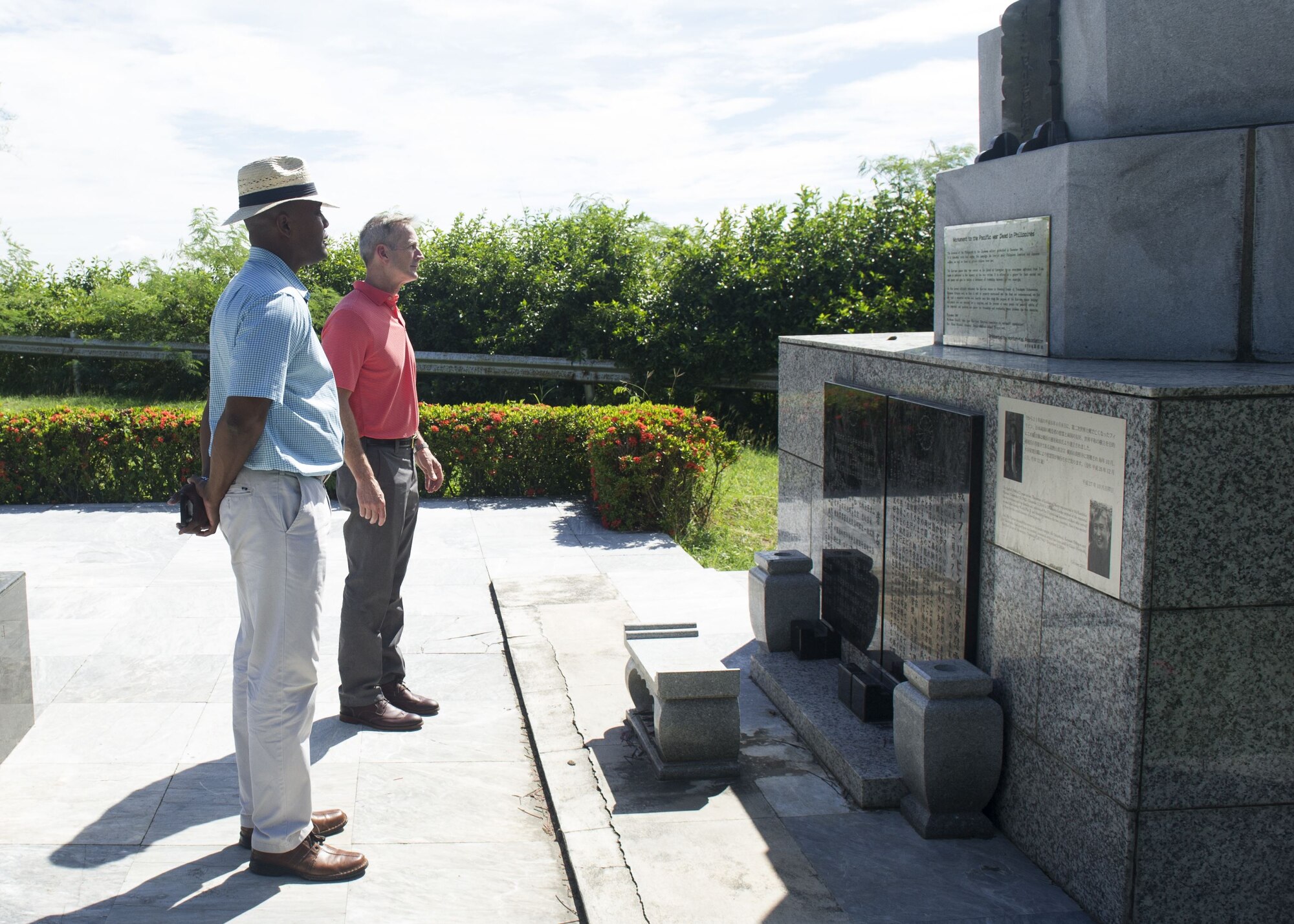 Gen. Terrence J. O’Shaughnessy, Pacific Air Forces commander, and Chief Master Sgt. Anthony Johnson, PACAF command chief, pay their respects to the Japanese soldiers lost during World War II on Corregidor Island, Philippines, during a historic tour of the island, Dec. 10.
