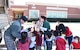 Tech. Sgt. Chad Ragland, a 301st Security Forces Squadron member, collects toys from local elementary students Friday, Dec. 15, 2017, during the unit's annual Ruck for Kids drive. The toys are for kids who are hospitalized at Cook Childrenʼs
Medical Center in Fort Worth, Texas. Students from O.A. Peterson, Haslet, and Sendera Ranch Elementary schools participated in the drive. (U.S. Air Force photos by Tech. Sgt. Melissa Harvey)