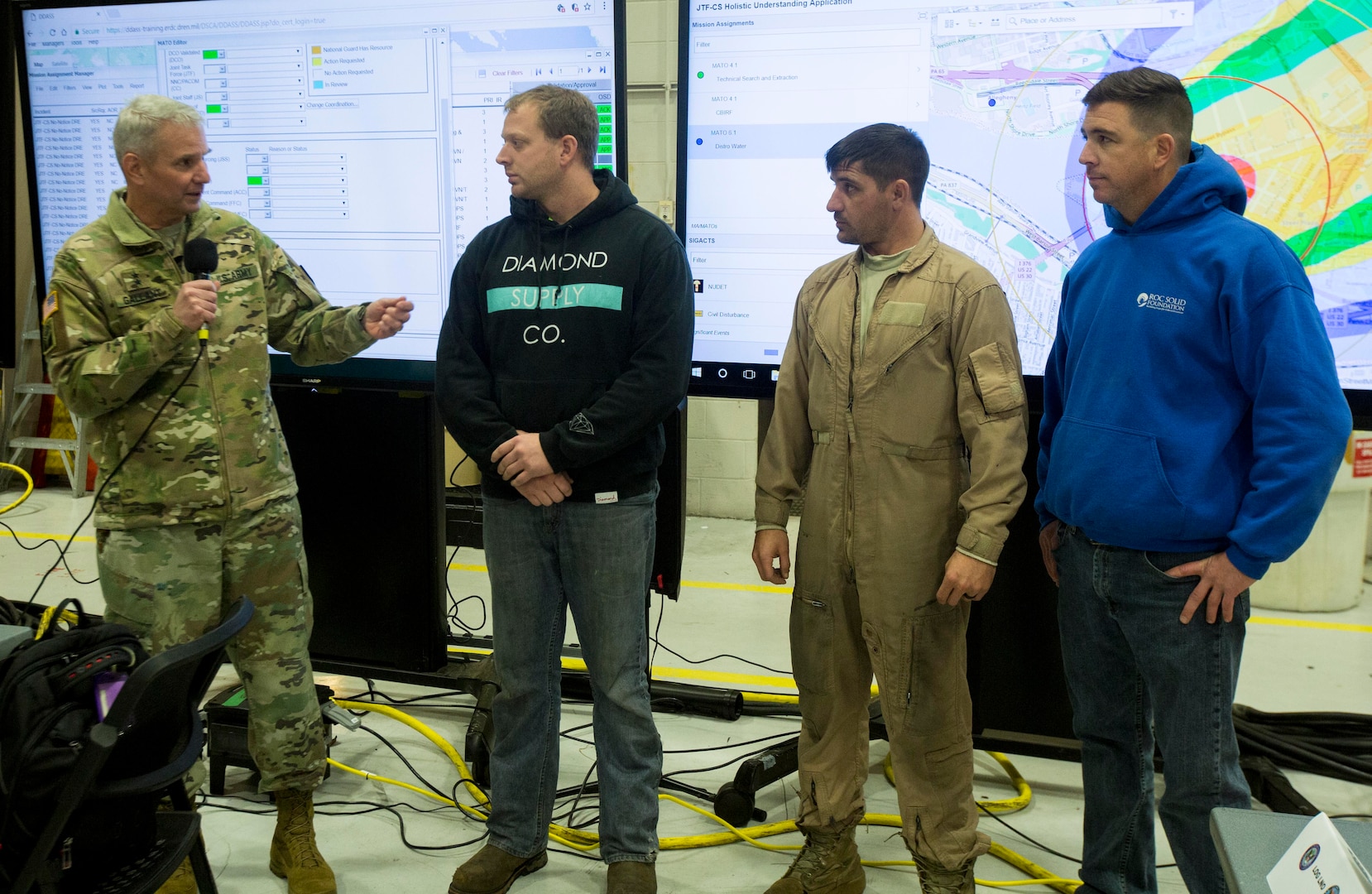 Maj. Gen. Richard Gallant, commander, Joint Task Force Civil Support speaks to members of the Felker Army Airfield during an award presentation December 14, 2017.